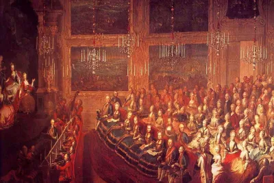 18th-century painting of a court concert in a chandelier-lit hall packed with listeners