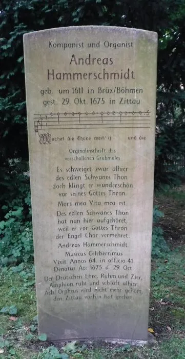 Memorial stone for composer Andreas Hammerschmidt with a carved inscription and musical notation